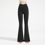 Women's black flare yoga pants with crossover waistband and side pockets, size XL – main product image