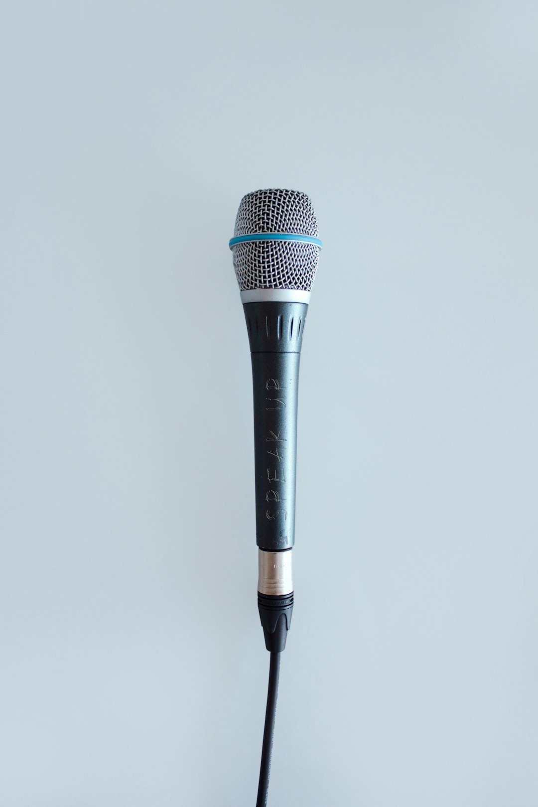 Black and grey microphone for karaoke and speaker use